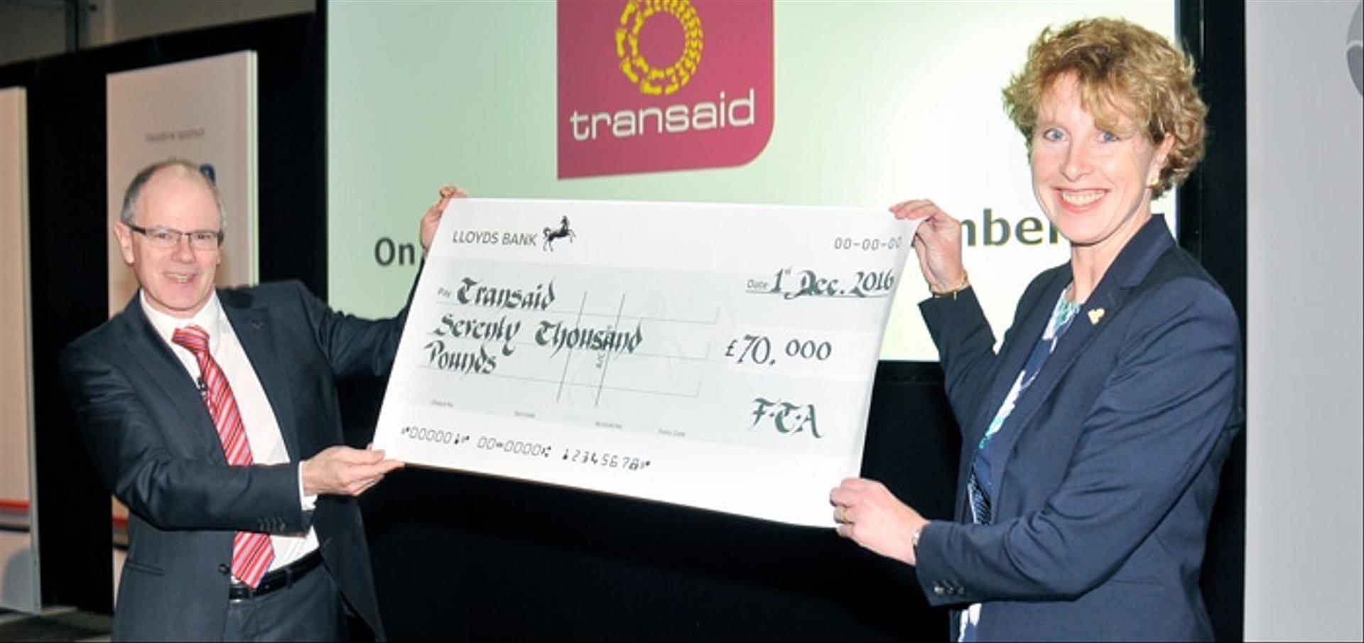 FTA presents Transaid with £70,000 cheque.